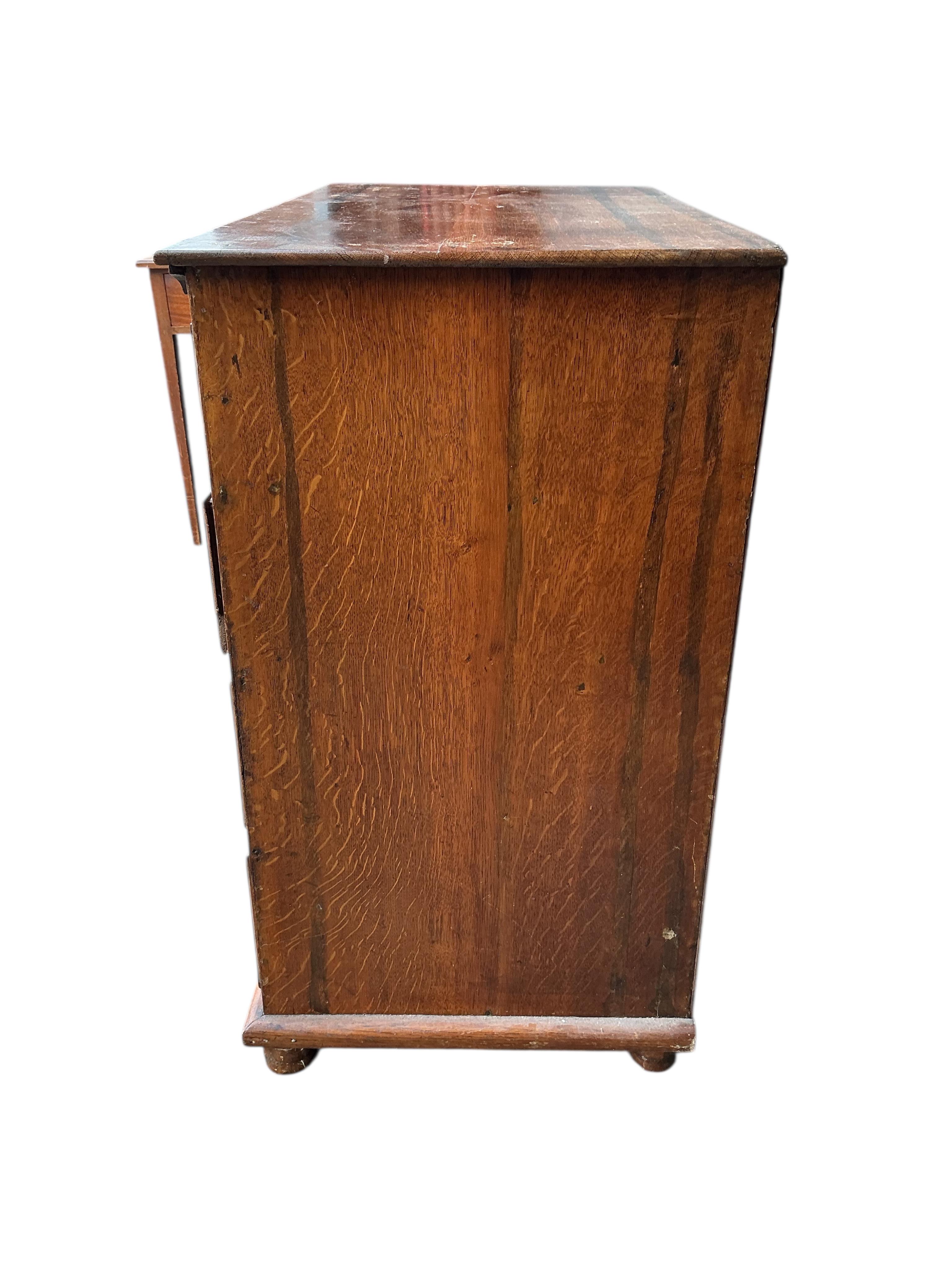 A George III oak chest of five drawers, width 93cm, depth 51cm, height 91cm